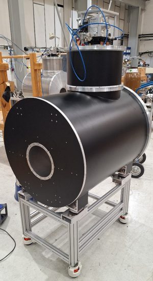 Black wrapped horizontal 7T240 magnet during factory testing at Scientific Magnetics manufacturing facility.