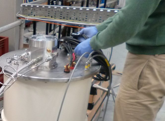 Image demonstrating liquid helium refill process.